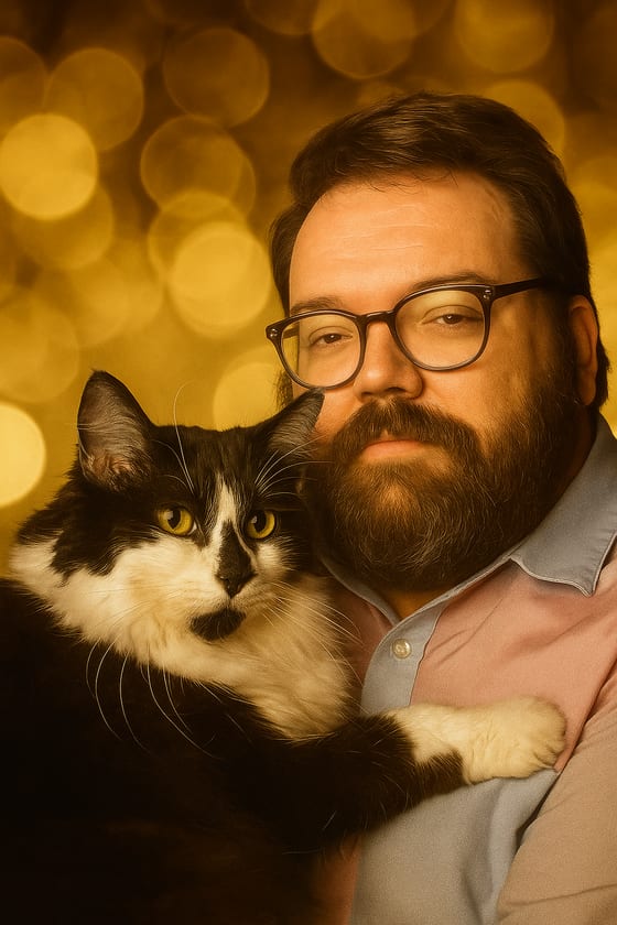 Andrew Mayes with his cat